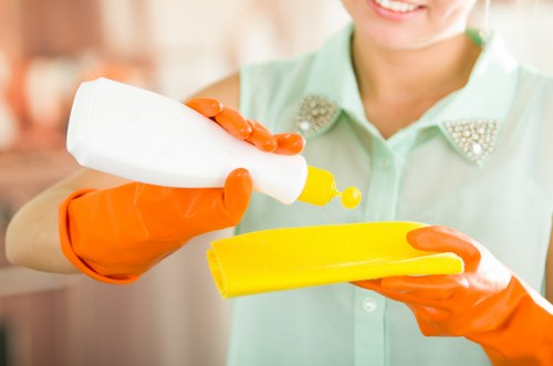 Local Brixton cleaning technician treating a stubborn fabric stain